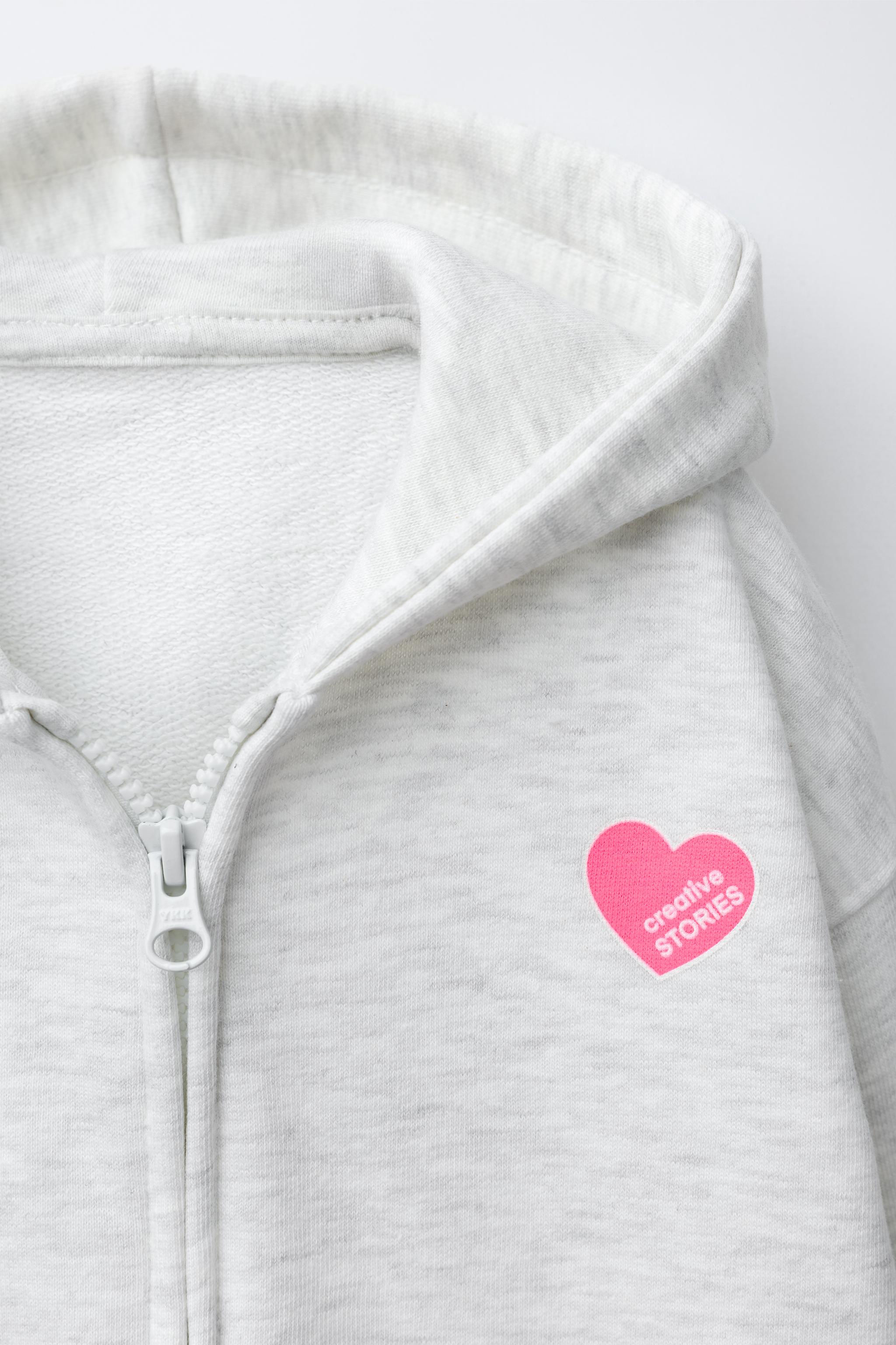 HEART PRINT ZIP-UP SWEATSHIRT